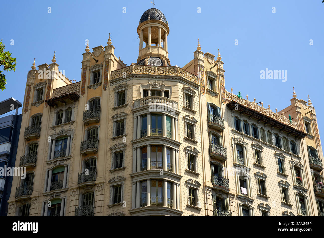 A house with a beautiful facade and roof dome on the Avinguda Diagonal in Barcelona Stock Photo