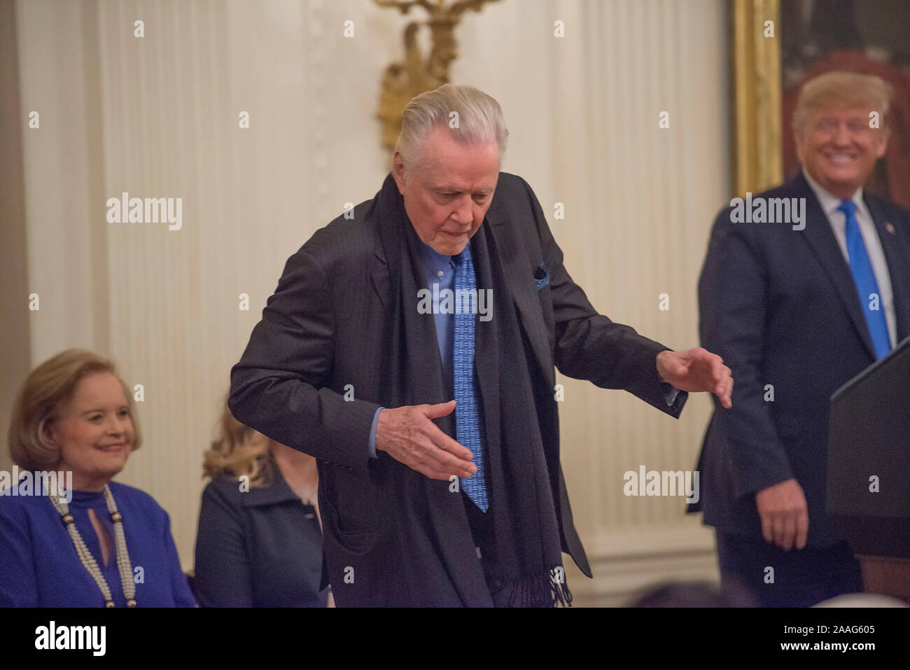 Washington DC, November 21 2019--Jon Voight does a little dance before President Donald J Trump presents the National Medal of Arts to Allison Krause, Stock Photo