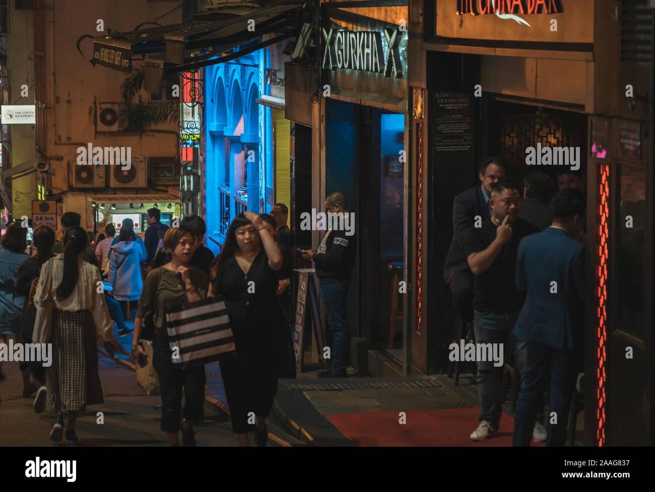 People talking on the street. Lan Kwai Fong a very popular nightlife