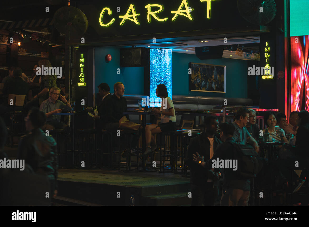 People talking on the street. Lan Kwai Fong a very popular nightlife