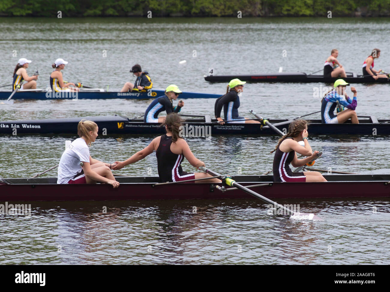 New Preston, CT USA. May 2016. Crew teammates giving a handshake after a grueling race. Stock Photo