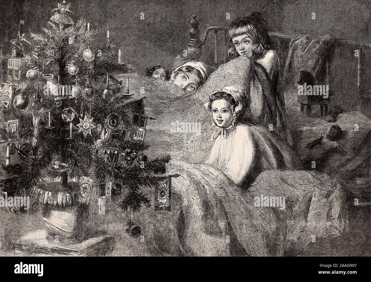 Victorian Era Family enjoying their private Christmas Tree, circa 1865 Stock Photo