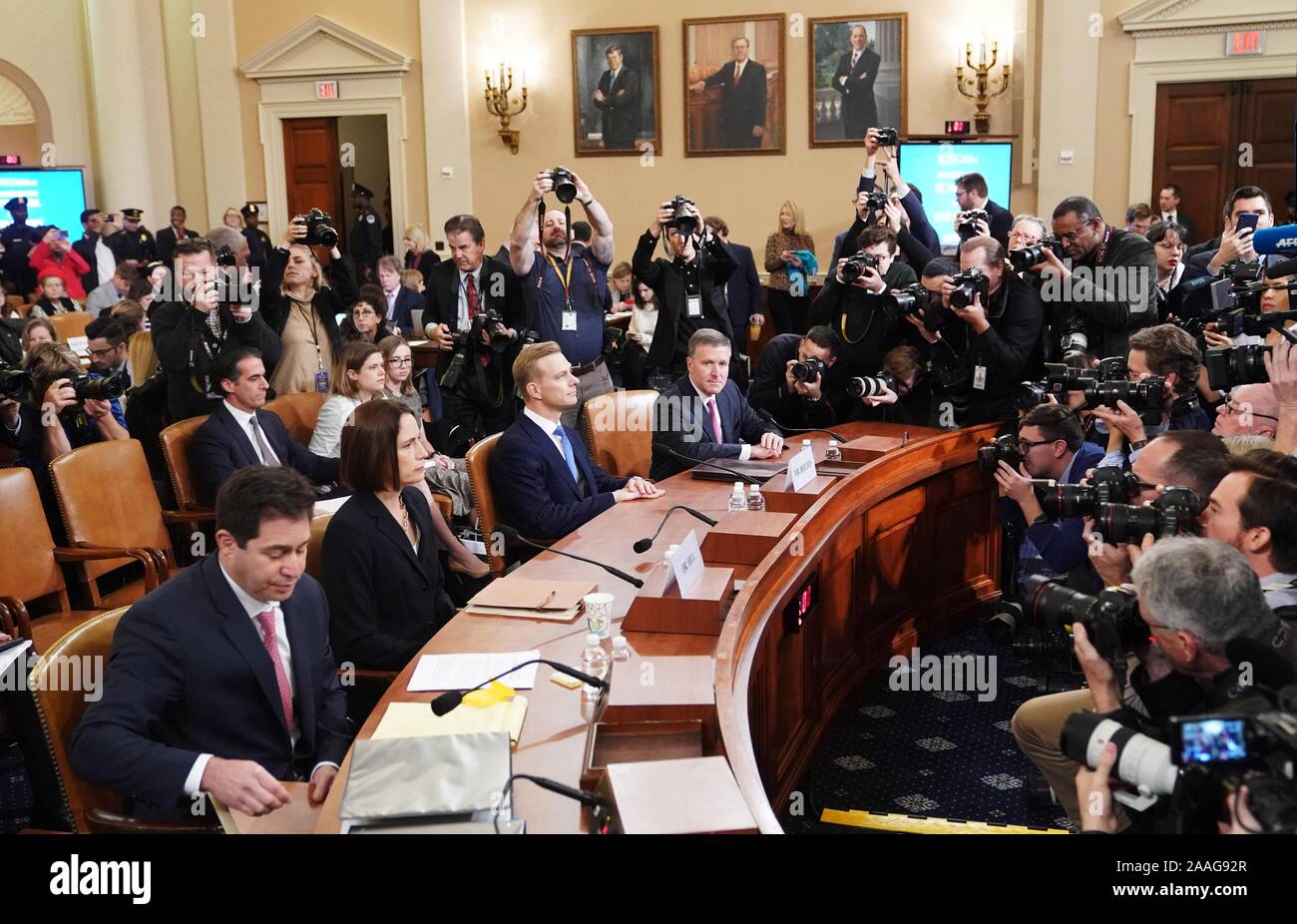 (191122) -- WASHINGTON, Nov. 22, 2019 (Xinhua) -- Fiona Hill (2nd L in the front row), former National Security Council senior director for Europe and Russia, and David Holmes (3rd L in the front row), a staffer from the U.S. Embassy in Ukraine, wait to testify before the U.S. House Intelligence Committee on Capitol Hill in Washington, DC, the United States, on Nov. 21, 2019. The last two witnesses scheduled for publicly testifying before a House panel as part of an impeachment inquiry into U.S. President Donald Trump offered their narratives of events relating to the investigation on Thursda Stock Photo