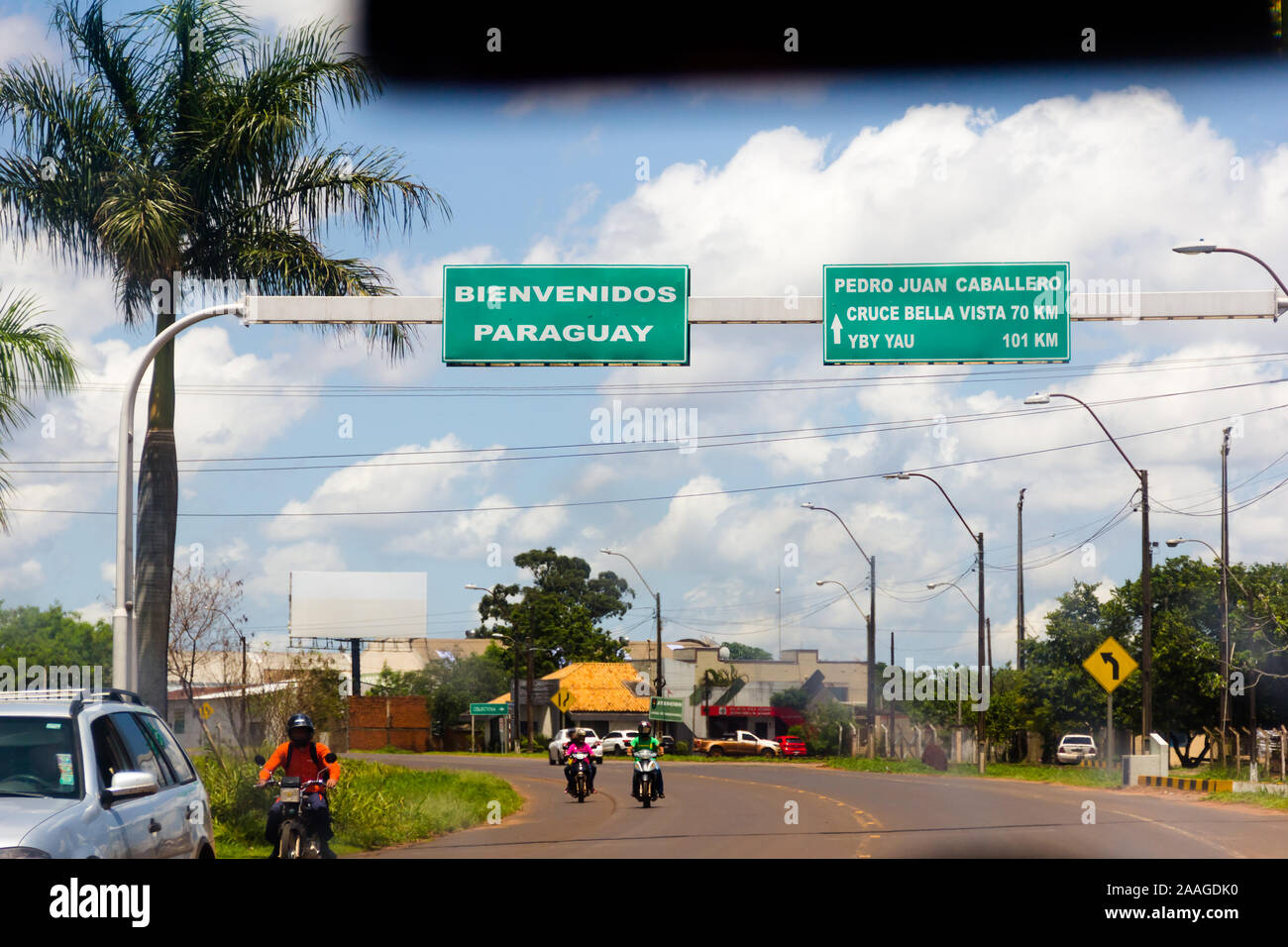 Road signs on the border between Brazil (Mato Grosso do Sul) and Paraguay (Pedro Juan Caballero). Stock Photo