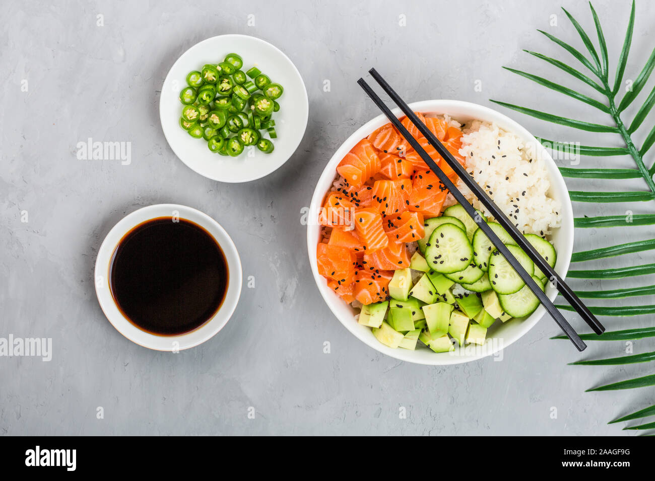 Download Hawaiian Salmon Bowl With Cucumbers Avocado Sesame Seeds And Rice Top View Overhead Flat Lay Mock Up Template Healthy Food Concept Stock Photo Alamy