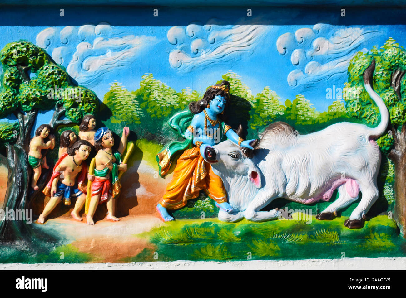 Demon in form of a cow attacked Krishna but killed in the ensuing Duel, Jagannath Temple, Dibrugarh, Assam, India Stock Photo