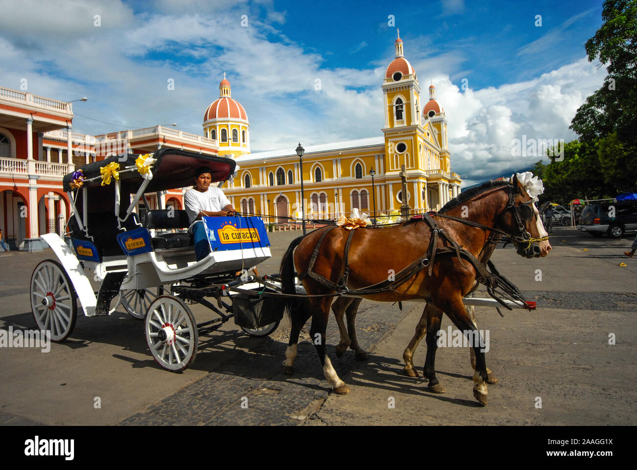 Servicio de cocheros en la ciudad de Granada. Ellos ofrecen paseos turisticos dentro de la ciudad de Granada, Nicaragua. Stock Photo