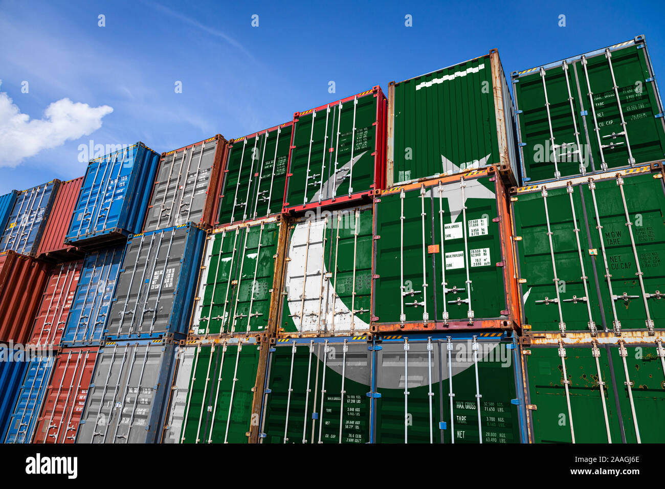 The national flag of Pakistan on a large number of metal containers for