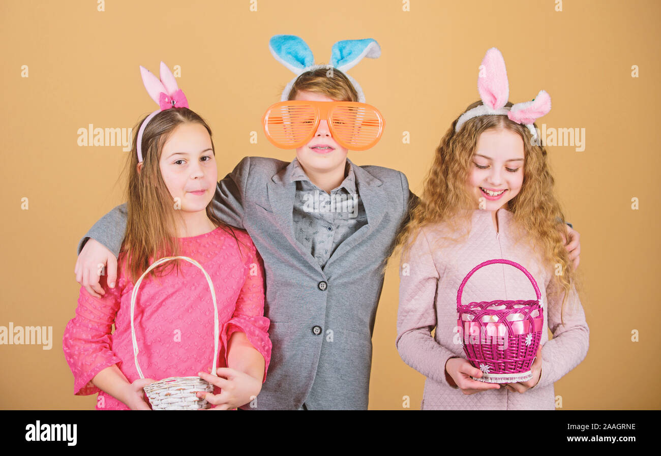 Easter bunny. Children in rabbit bunny ears. Spring holiday party. Egg