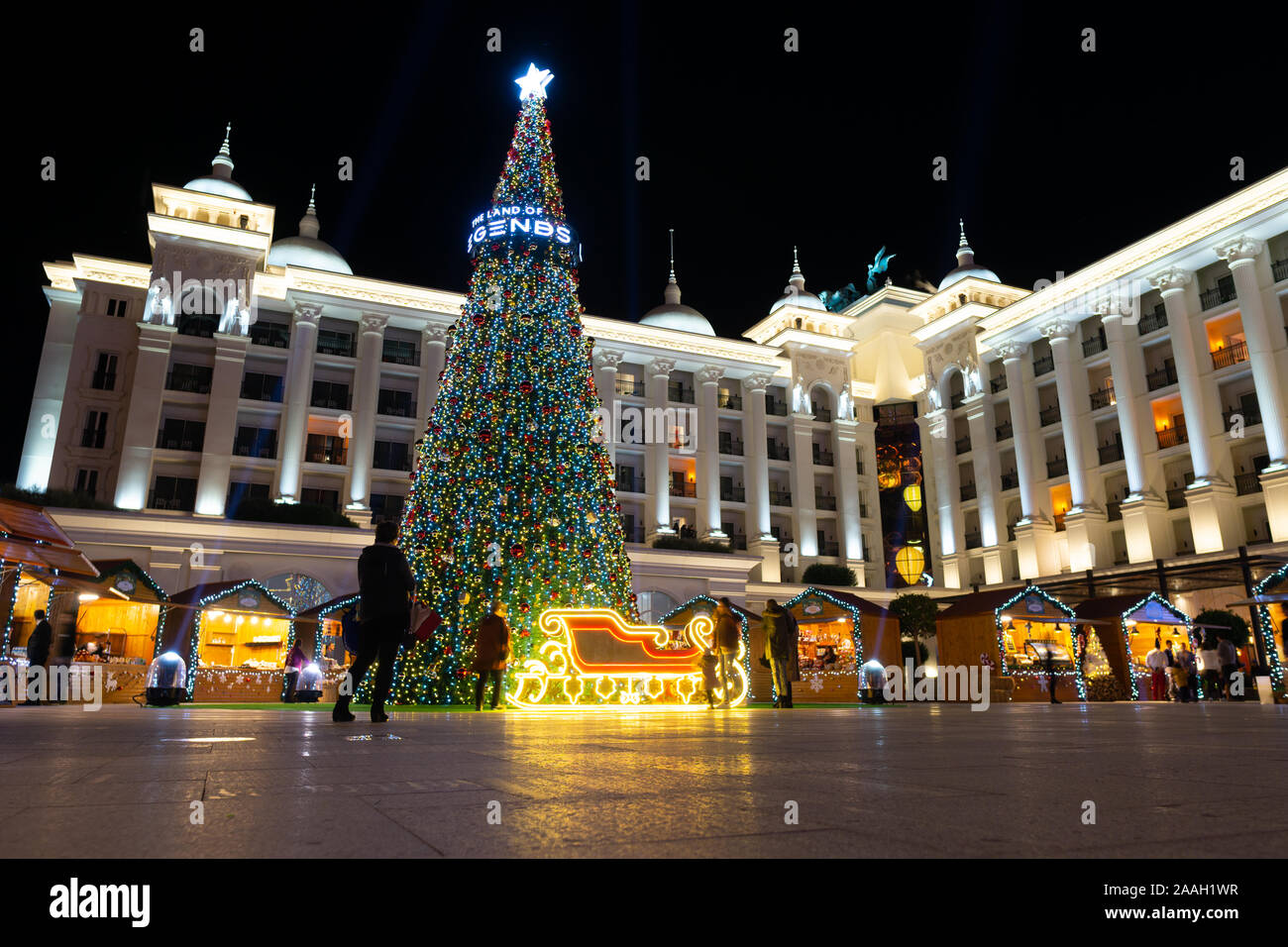 Antalya, Turkey - 1st December 2018: Christmas tree in main yard in Land of Legends theme mall. Evening.A very big shopping mall and fun park . Stock Photo