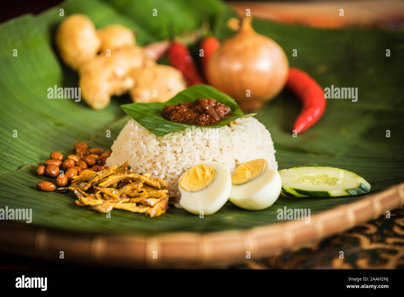 Nasi Lemak is a malay fragrant rice dish cooked in coconut milk and pandan leaf Stock Photo Alamy