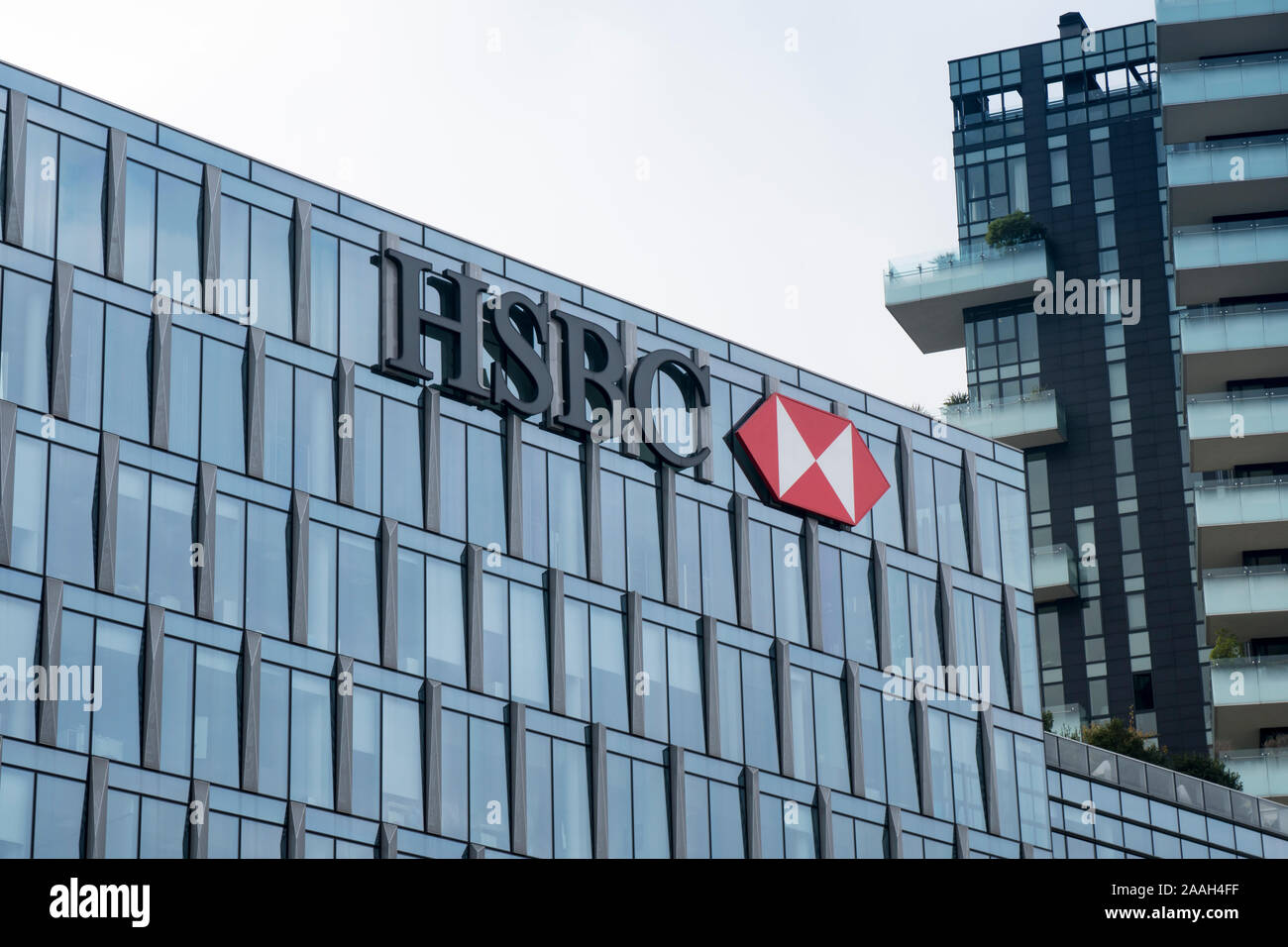 Milan, Italy: HSBC bank logo on the building of company headquarters in Milan Stock Photo