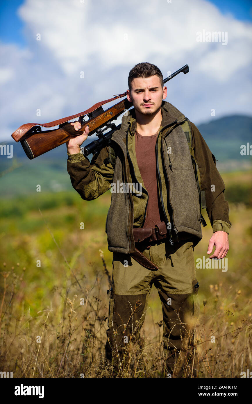 Hunting season. Hunting weapon gun or rifle. Man hunter carry rifle