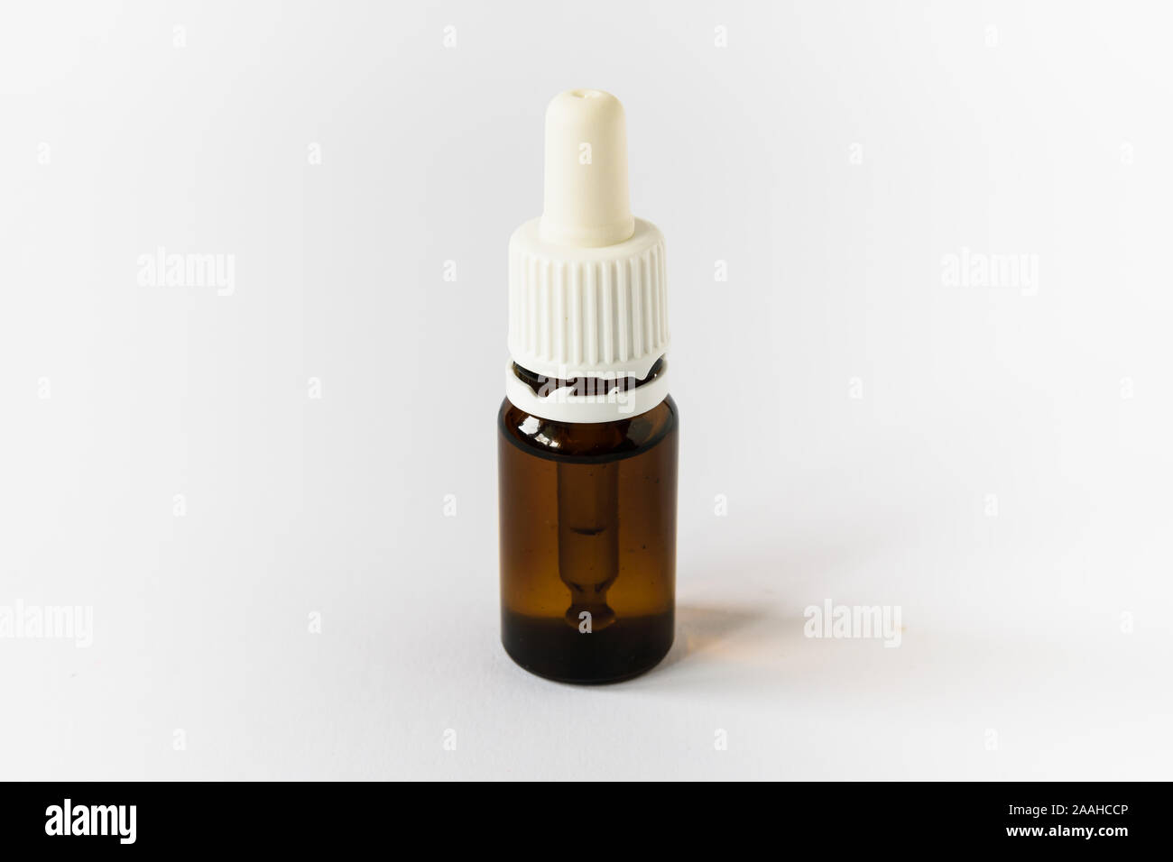 White Eye Dropper Bottle. Brown bottles, medicine - isolated. Stock Photo