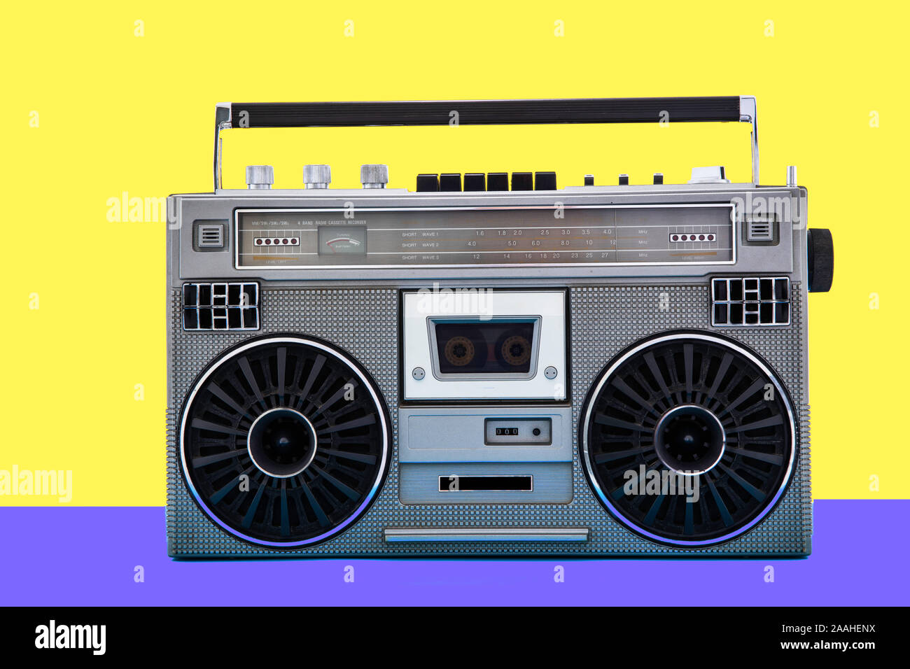 1980s Silver retro radio boom box on color background. Stock Photo