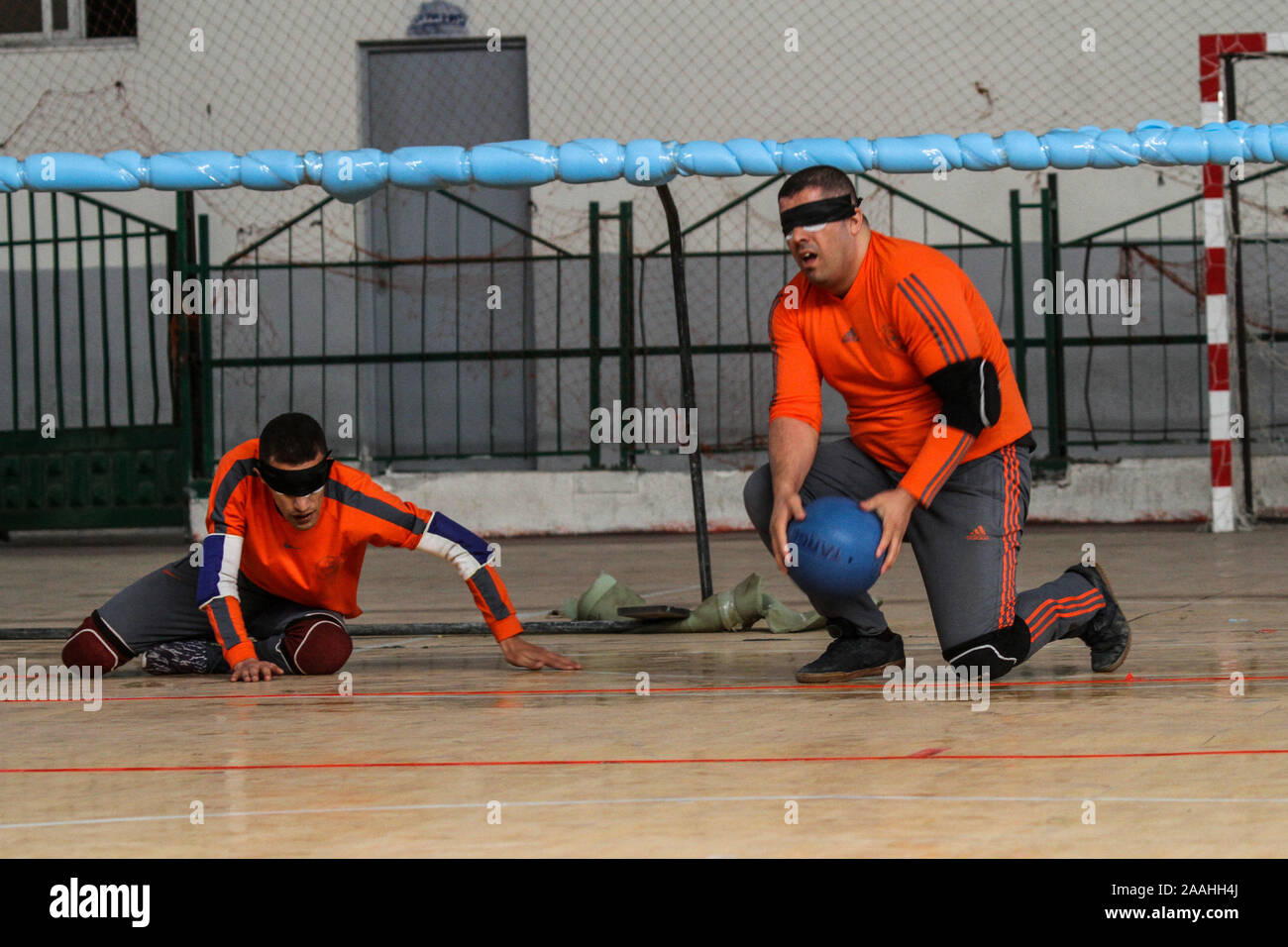 November 21, 2019: Gaza, Palestine. 21 November 2019. Palestinian Federation of goalball opens Gaza's Goalball championship in the Saed Sayel Sports Hall in Gaza City. The tournament, which is designed for visually impaired  athletes, it is the first one taking place in the Gaza Strip. In the game, players try to throw a ball with bells into the opponents' goal, by hand. (Credit Image: © Ahmad Hasaballah/IMAGESLIVE via ZUMA Wire) Stock Photo