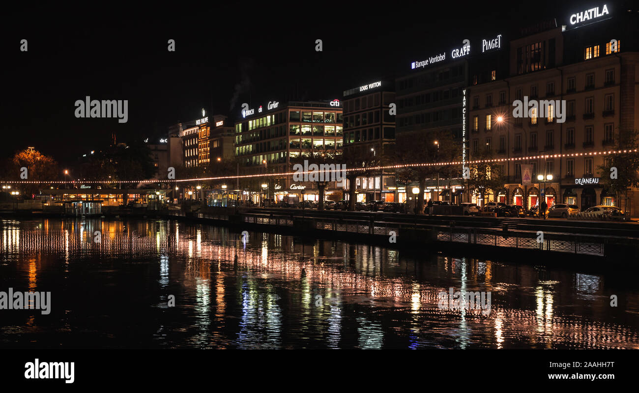 Geneva, Switzerland - November 24, 2016: Cityscape with illuminated houses in central district of Geneva city at night Stock Photo