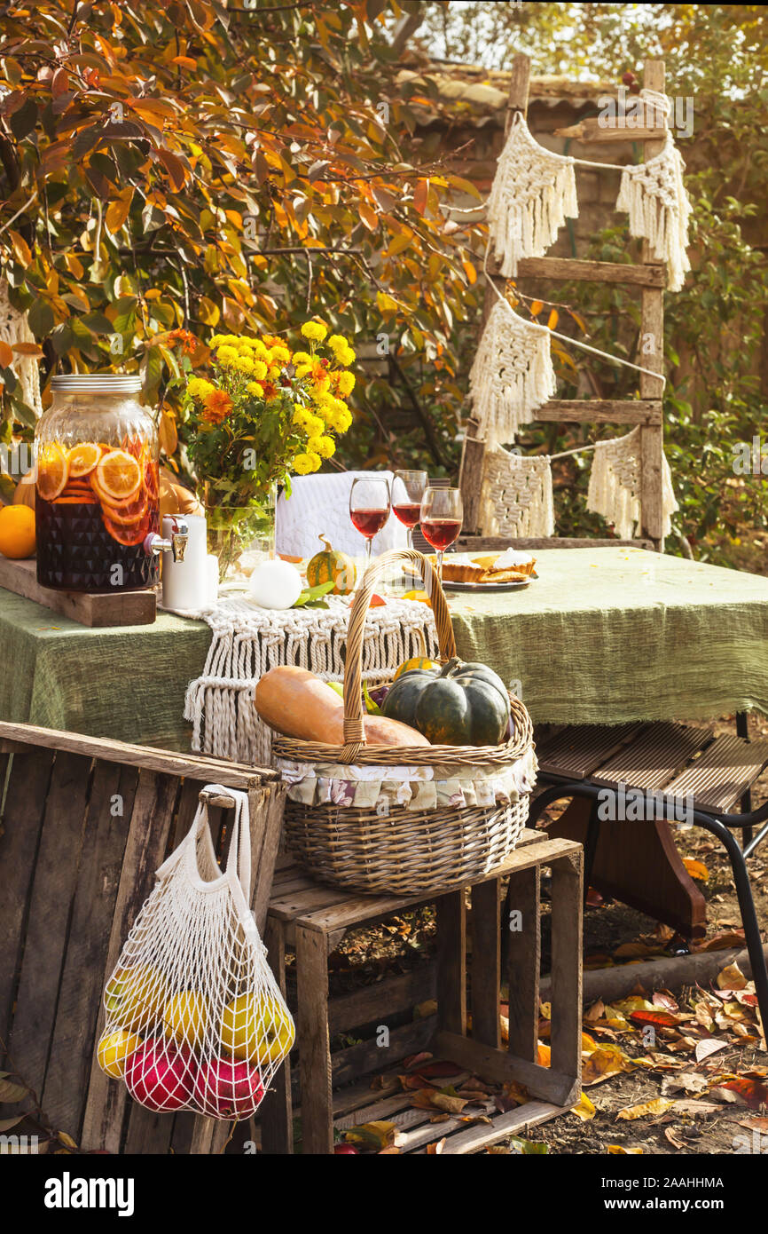 https://c8.alamy.com/comp/2AAHHMA/beautiful-festive-dinner-in-the-garden-among-autumn-leaves-and-pumpkins-with-wine-and-different-pies-thanksgiving-day-concept-2AAHHMA.jpg