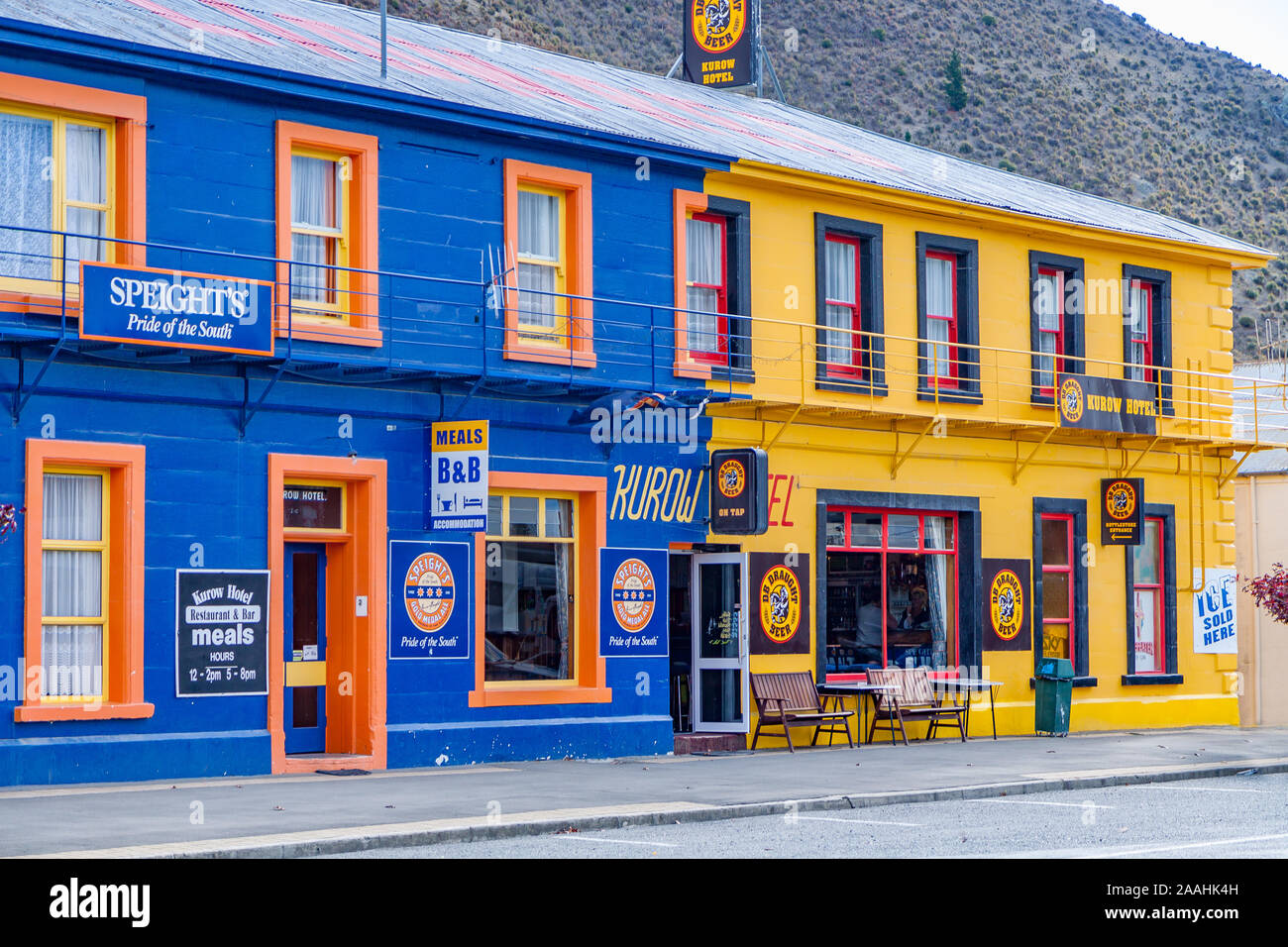 Blue and yellow painted bars in Dunedin, New Zealand Stock Photo Alamy