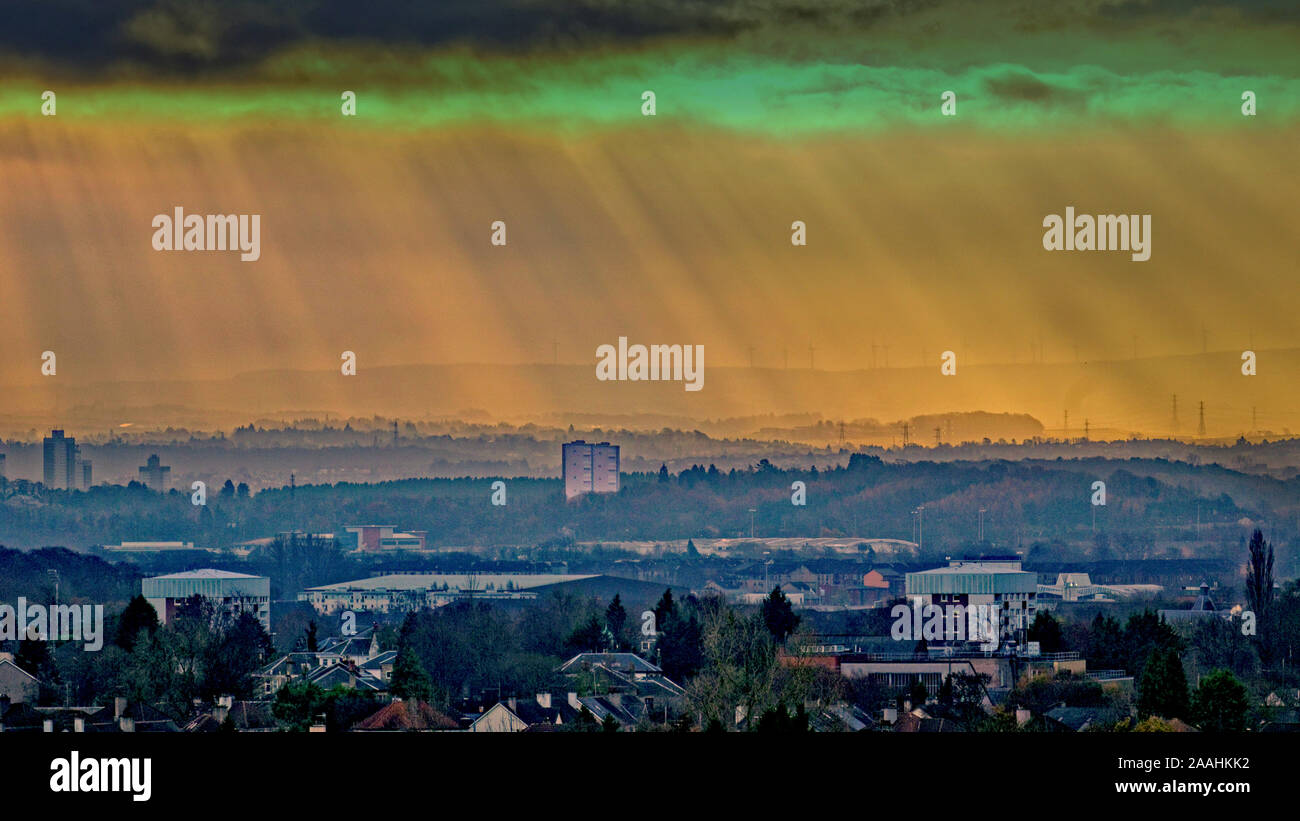 Glasgow, Scotland, UK 22nd November, 2019. UK Weather: God rays, crespecular rays or sunbeams through the thick cloud in a grimly lit day morning over bellahouston park in  the south of the city. Gerard Ferry/ Alamy Live News Stock Photo
