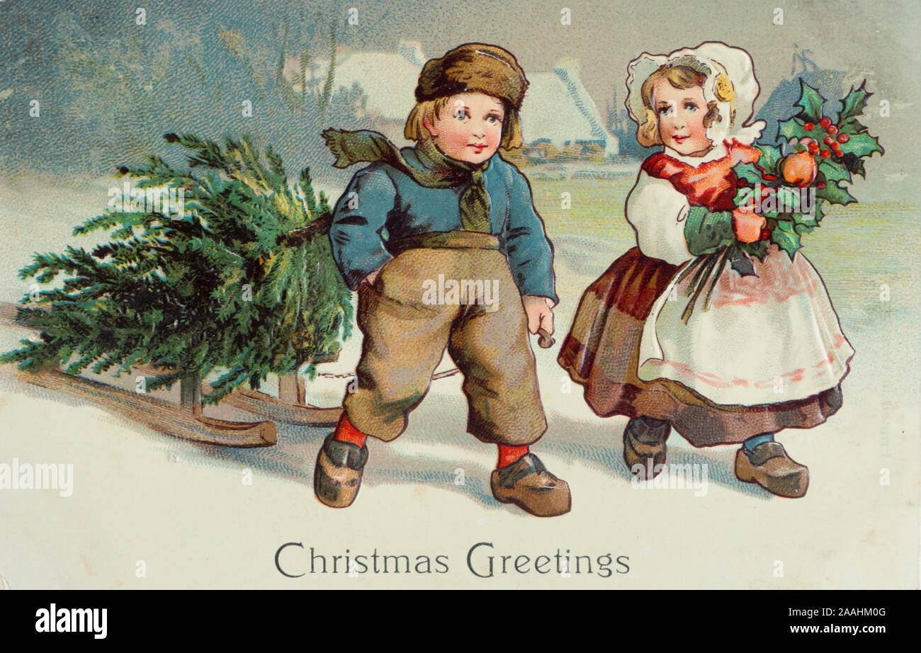 Two children fetching a Christmas tree on a sledge in traditional clothes and wooden clogs, cute drawing on a Vintage Christmas post card mailed ca 1910 in New York USA Stock Photo