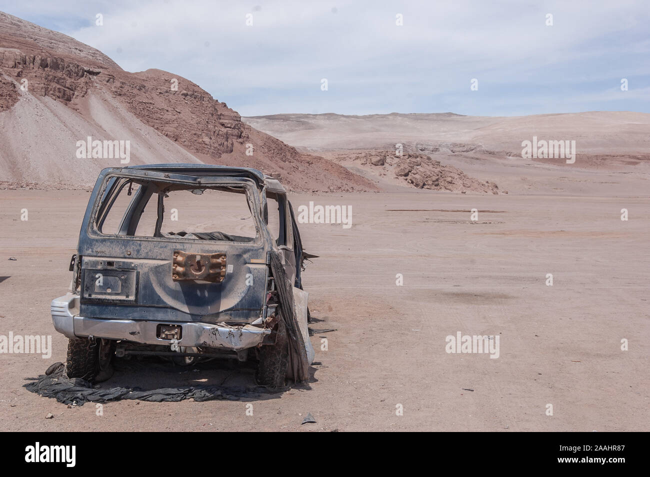 Abandoned off road vehicle in desert, San Pedro de Atacama, Chile Stock Photo