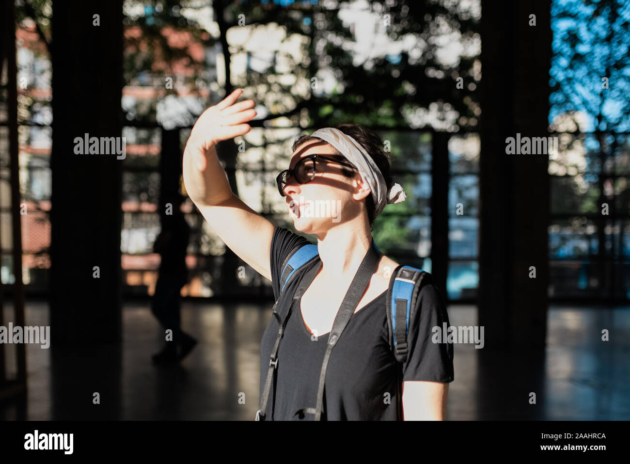 Covering eyes from sun hires stock photography and images Alamy