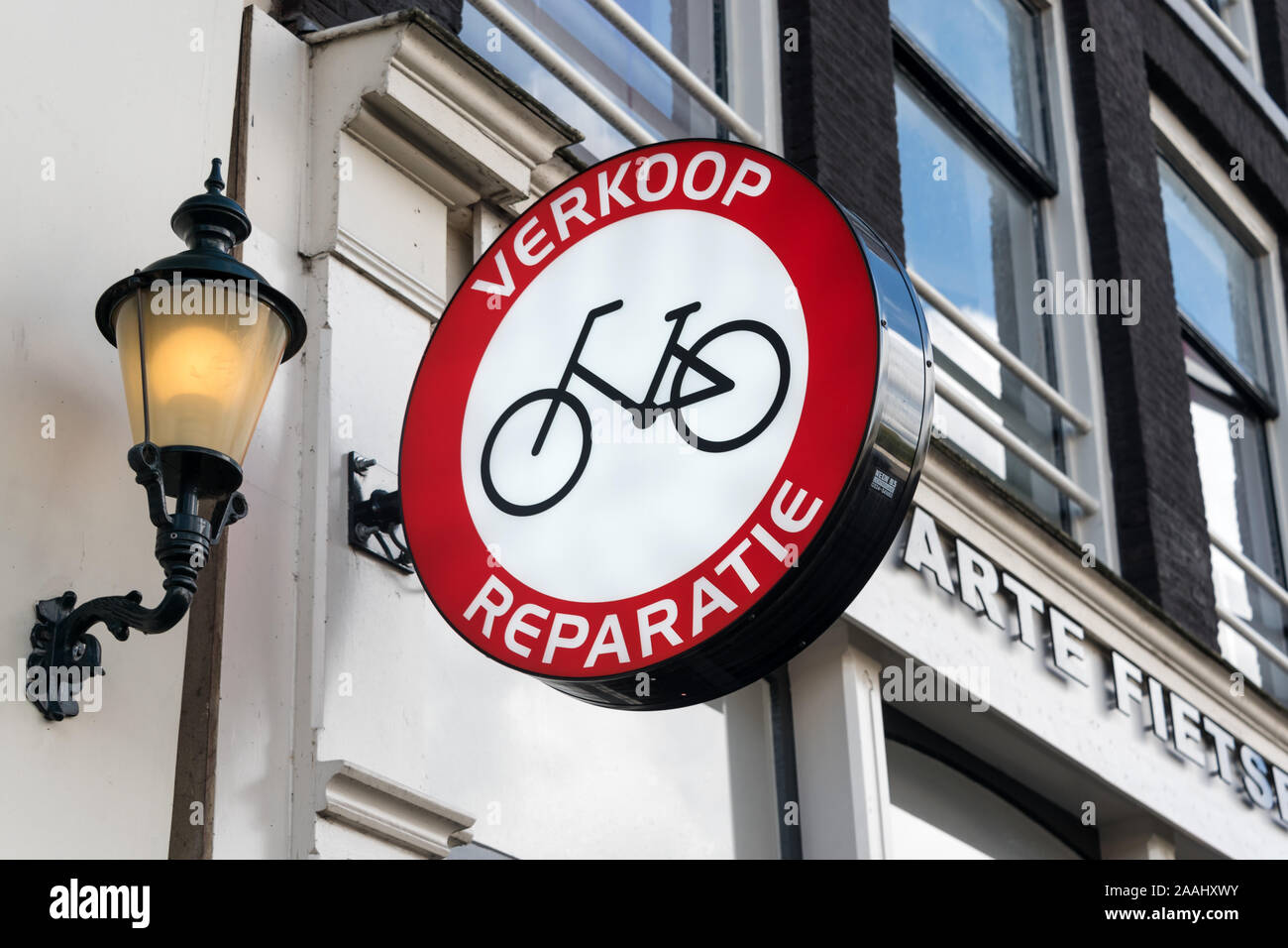 Sale and repair bicycle sign in Amsterdam, The Netherlands. Bicycle