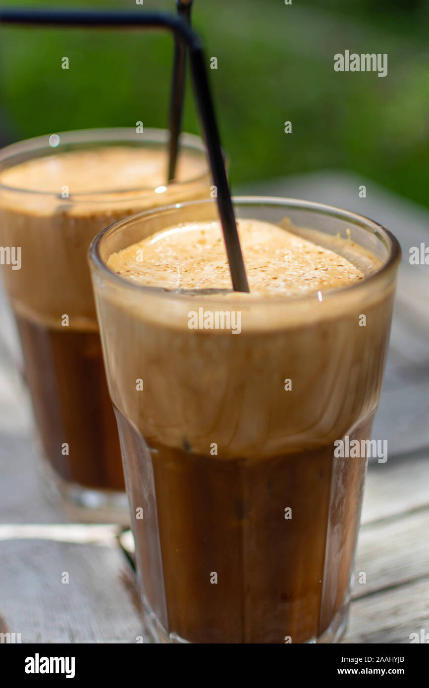 Traditional greek cold coffee Frappe with foam made from water, instant