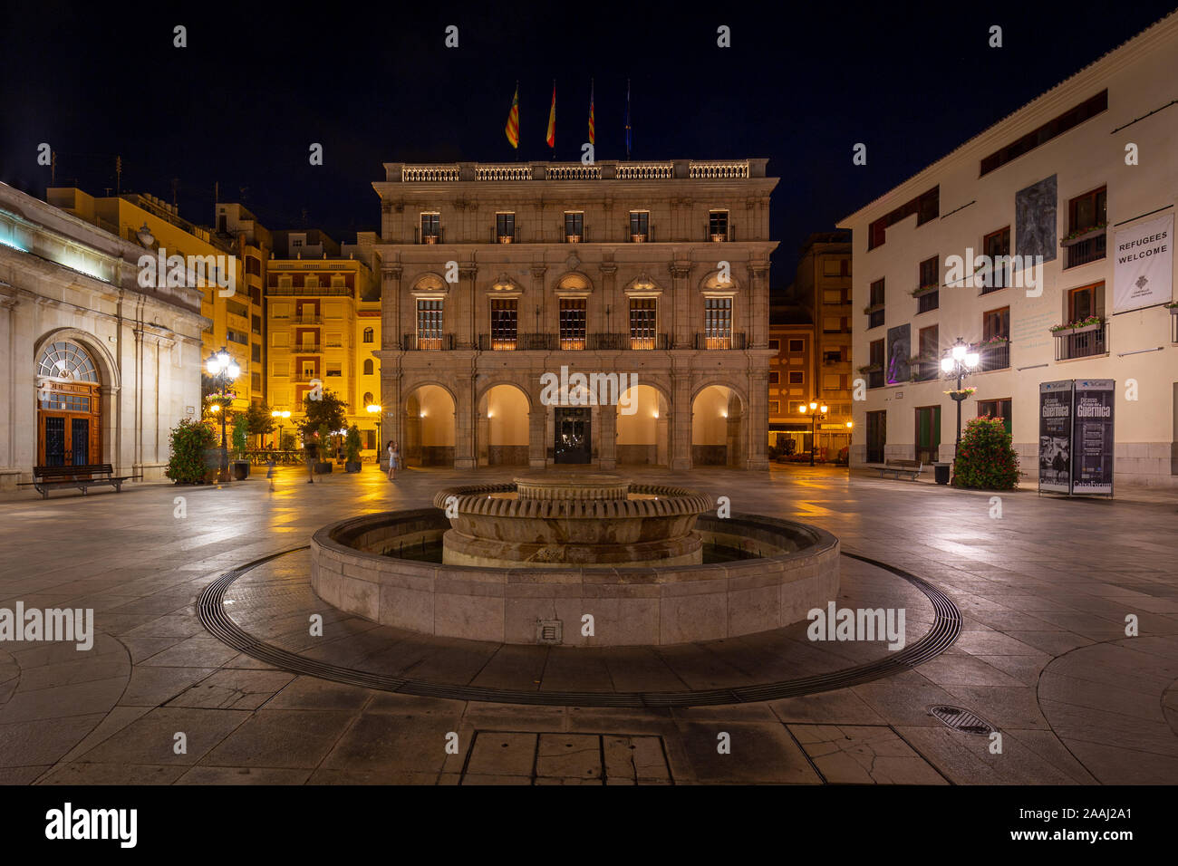 Town Hall in Castellon, Spain in night - 2019.08.10. Building of historic town hall with fountain next to it. Stock Photo