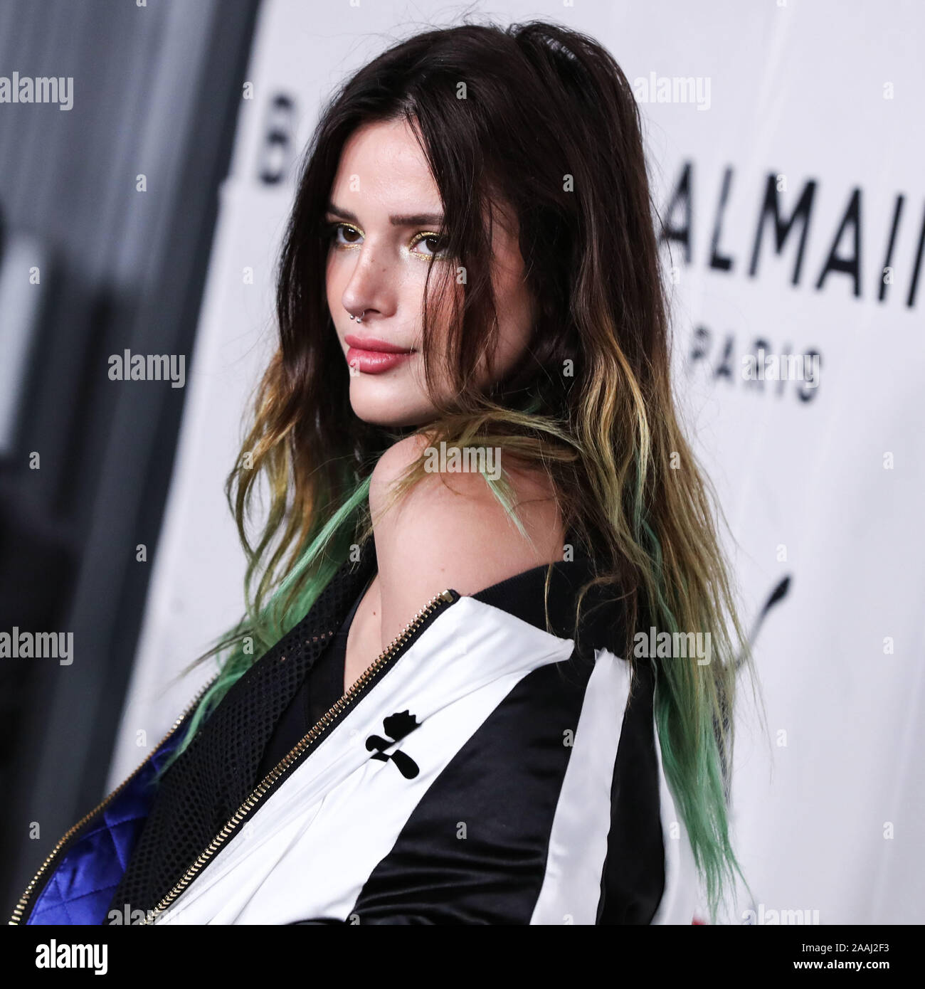 HOLLYWOOD, LOS ANGELES, CALIFORNIA, USA - NOVEMBER 21: Actress Bella Thorne  arrives at the PUMA x Balmain Los Angeles Launch Event held at Milk Studios  on November 21, 2019 in Hollywood, Los