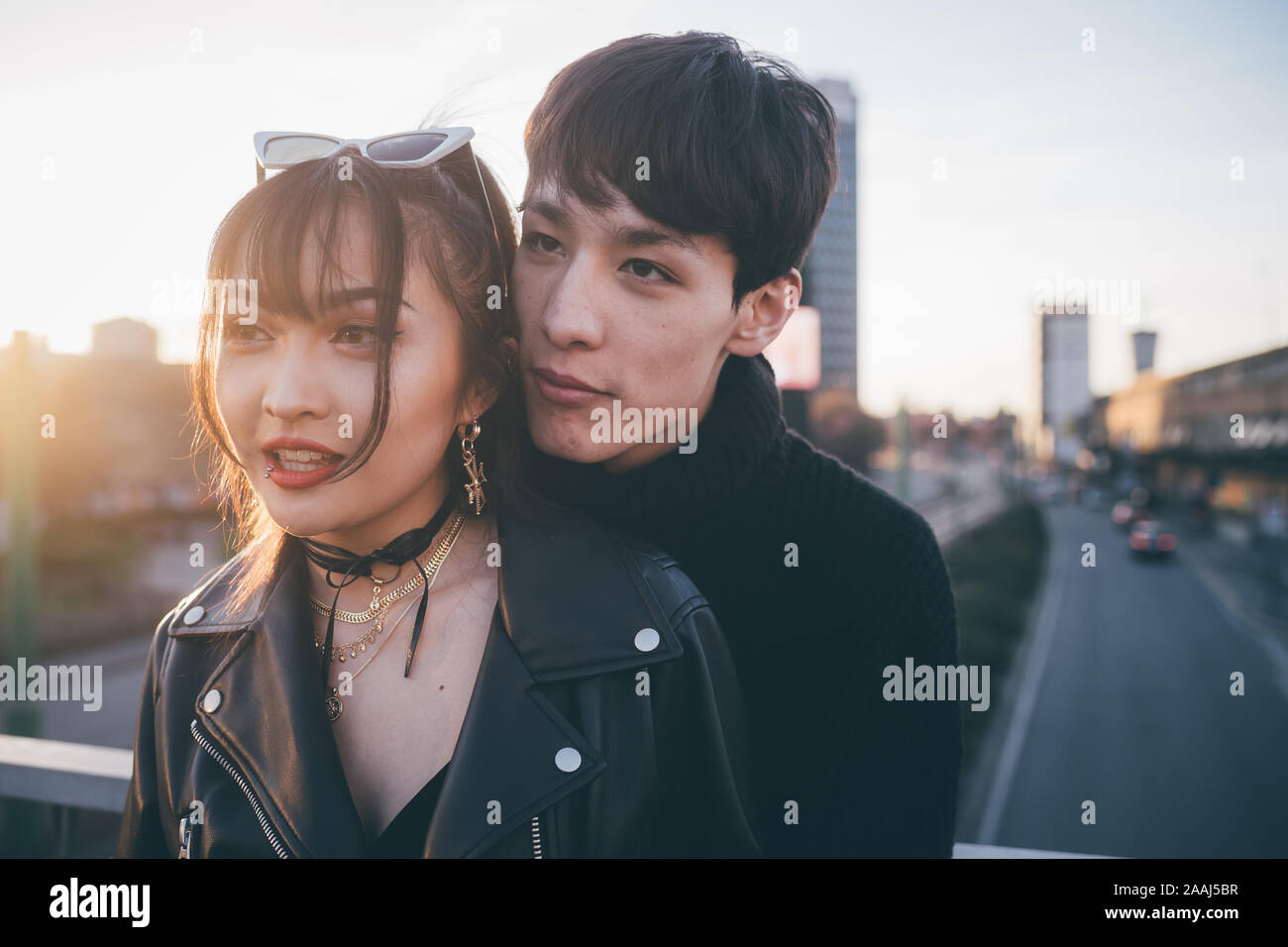 Couple hugging on bridge hi-res stock photography and images - Alamy