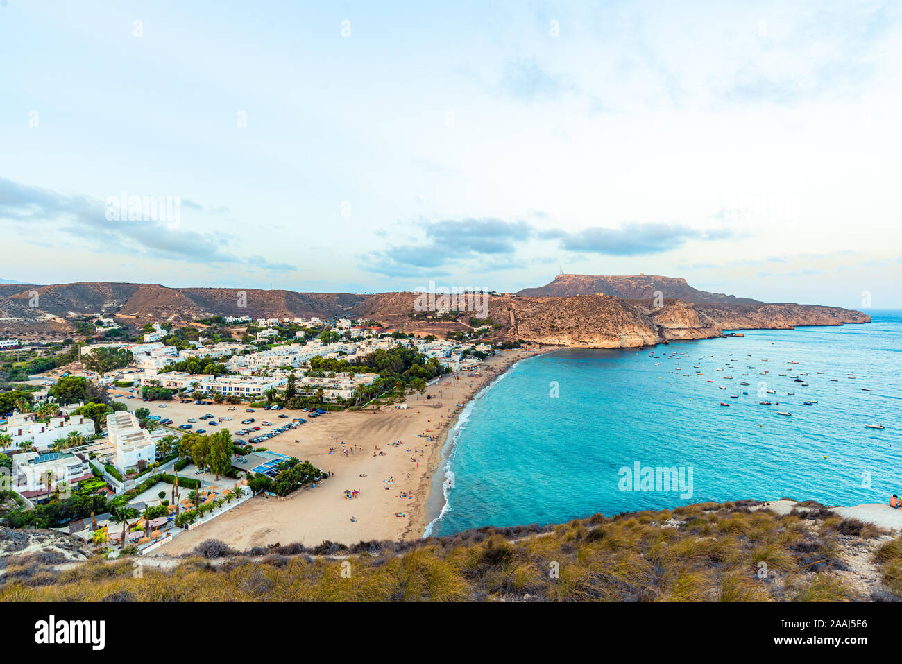 Agua Amarga, Spain - August 8, 2018. Sunset over the village Agua Amarga. As seen from the western hill. Stock Photo