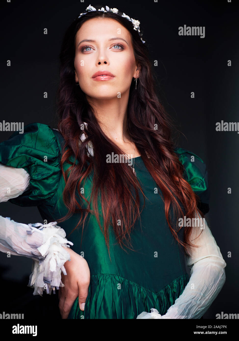 beautiful woman wearing vintage green dress Stock Photo - Alamy