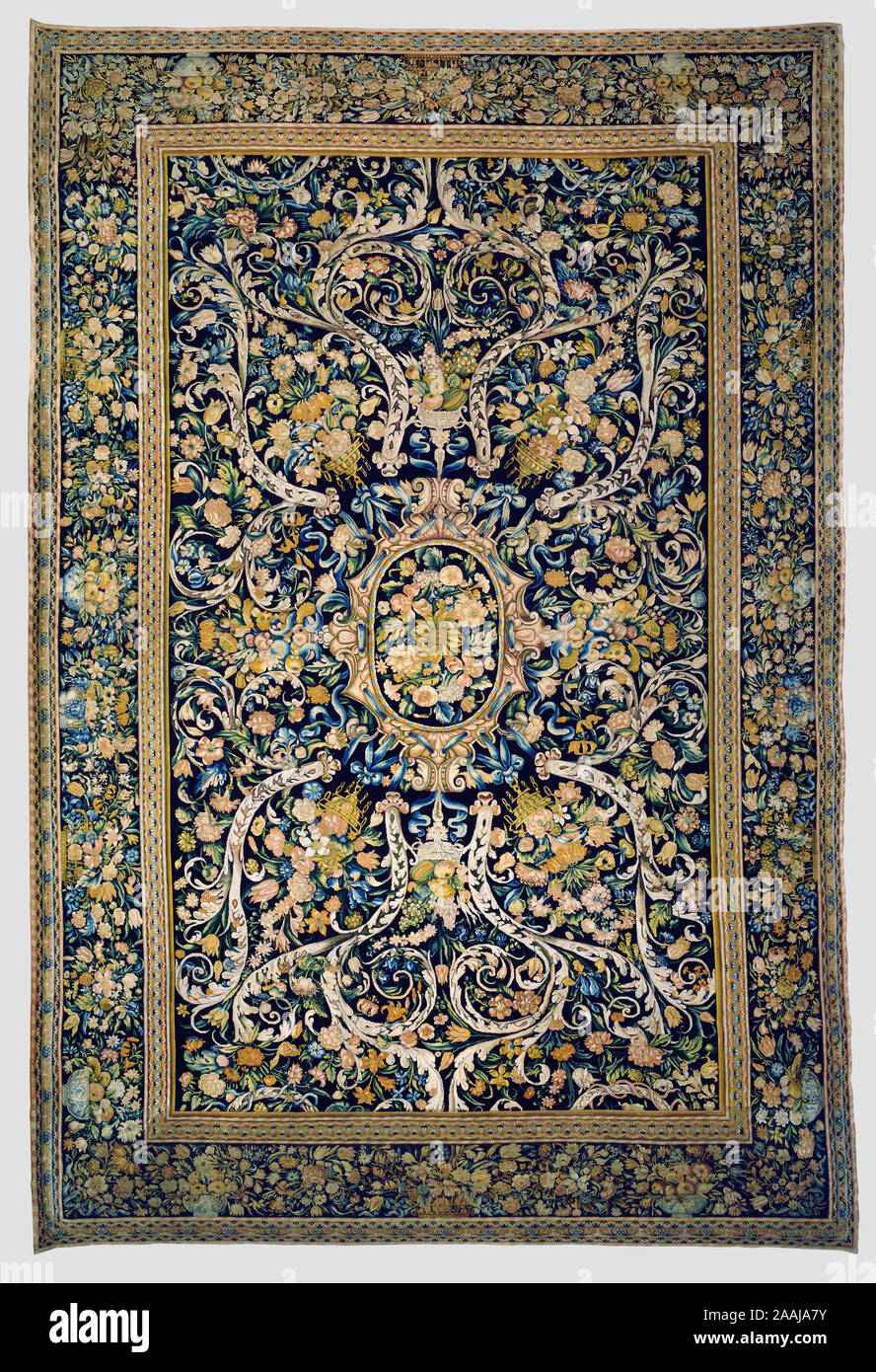 Carpet; Made in the Chaillot Workshops of Philippe Lourdet (French), and Simon Lourdet, Savonnerie Manufactory (French, active 1627 - present); Paris, France; about 1665 - 1666; Wool and linen; modern cotton lining; 642.1 x 428.8 cm (252 13/16 x 168 13/16 in.); 70.DC.63 Stock Photo