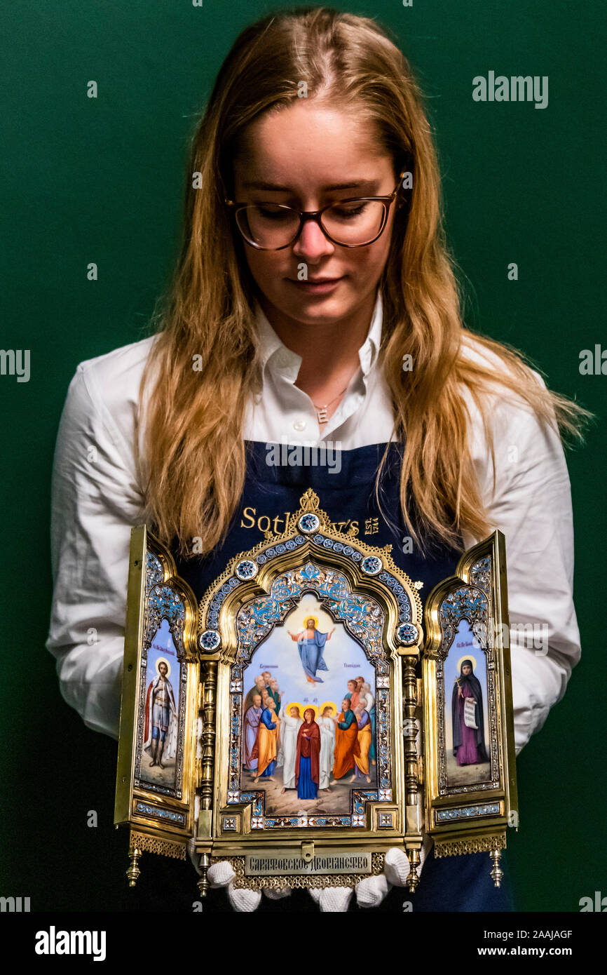 Sothebys, London, UK. 22nd Nov 2019. An important and rare porcelain vase, imperial porcelain factory, St Petersburg, Period Of Nicholas Ii, 1898, Estimate: 40,000 - 60,000 GBP - A silver-gilt cloisonné and pictorial enamel triptych icon, Khlebnikov, Moscow, 1899-1908, Estimate: 100,000 - 150,000 GBP - Sotheby’s previews its Russian Art Week with works from its Russian Pictures and Works of Art, Fabergé and Icons sales on 26 November in London. Credit: Guy Bell/Alamy Live News Stock Photo