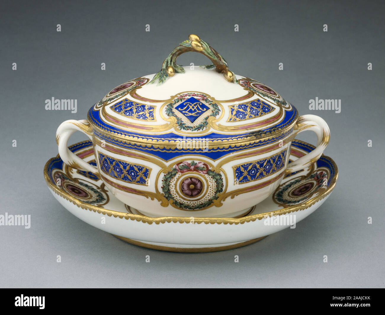 Lidded Bowl on Dish; Painted by Pierre-Antoine Méreaud (French, active 1754 - 1791), Sèvres Manufactory (French, 1756 - present); 1764; Soft-paste porcelain with polychrome enamel colors and gilding; 12.4 x 19.7 x 15.2 cm (4 7/8 x 7 3/4 x 6 in.) Stock Photo