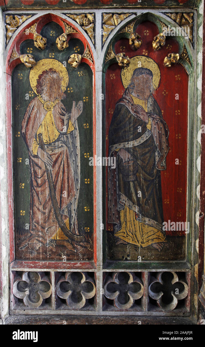 Painted rood screen depicting Ss James the Less & Philip, heavily defaced during the iconoclasm of the Civil War, St Peter's Church, Belaugh, Norfolk Stock Photo