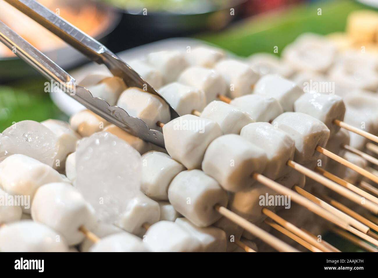 fish ball stick freez with ice are chose and grip by customer Stock Photo
