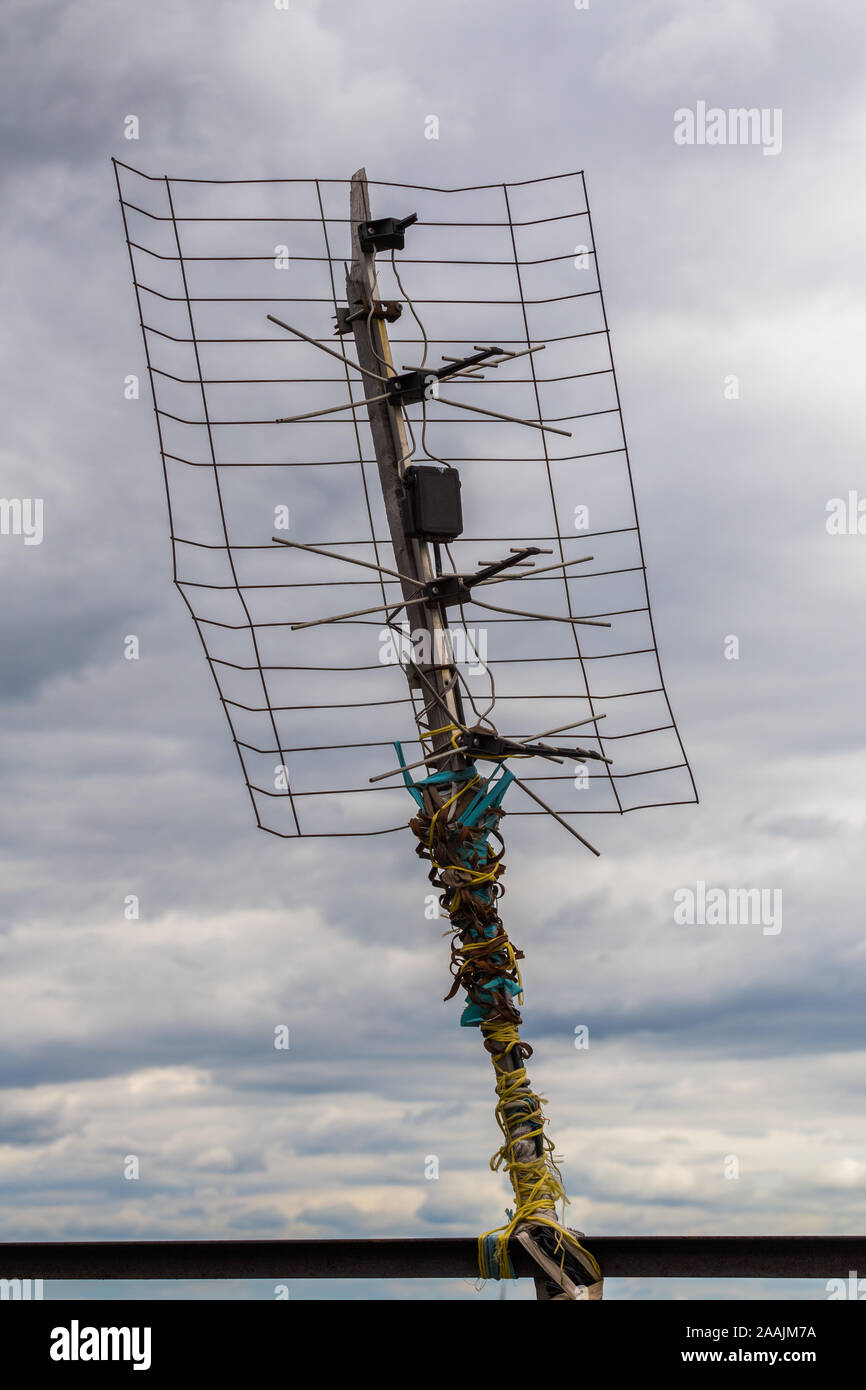 ugly old tv antenna outdoor on overcast sky background with selective focus  Stock Photo - Alamy