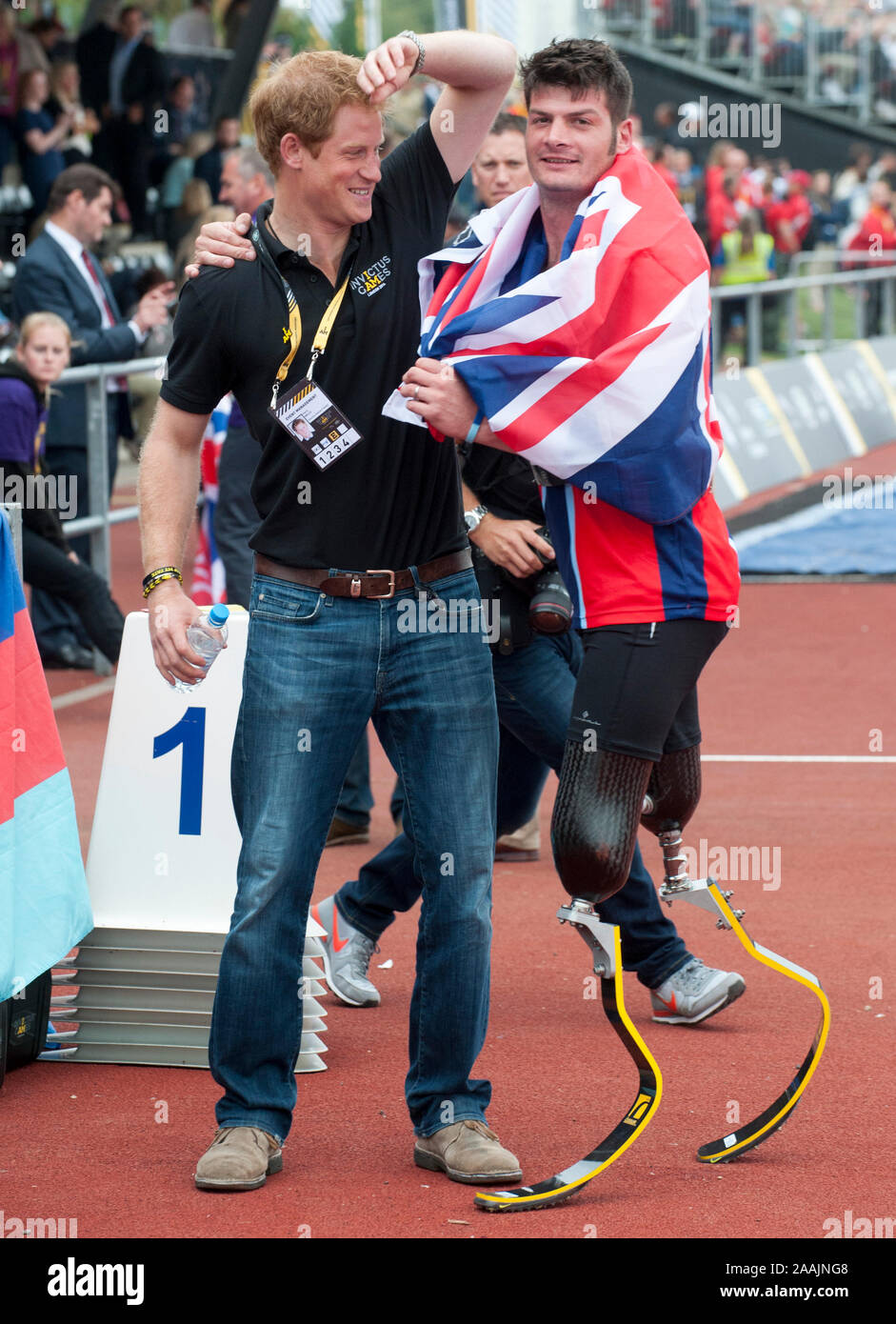 Prince Harry, with team Captain David Henson winner of the 200m race at