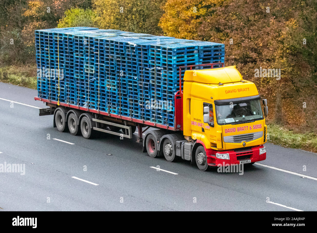 David Bratt & Sons Haulage delivery trucks carrying blue wooden pallets; , lorry, transportation