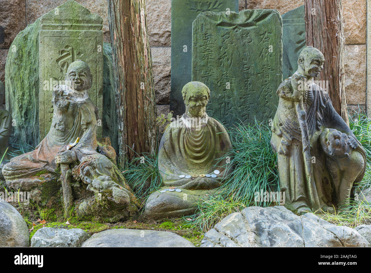 Stone statues of the sixteen arhats of Zen Buddhism with commemorative plates Itahi adorned with