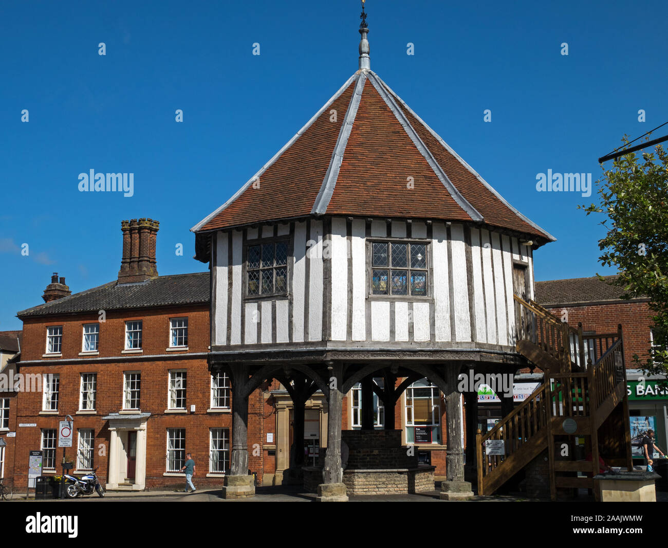 The Medieval timber-framed Market Cross, built around 1617, in the center of the Market Town of Wymondham in Norfolk, England, UK Stock Photo