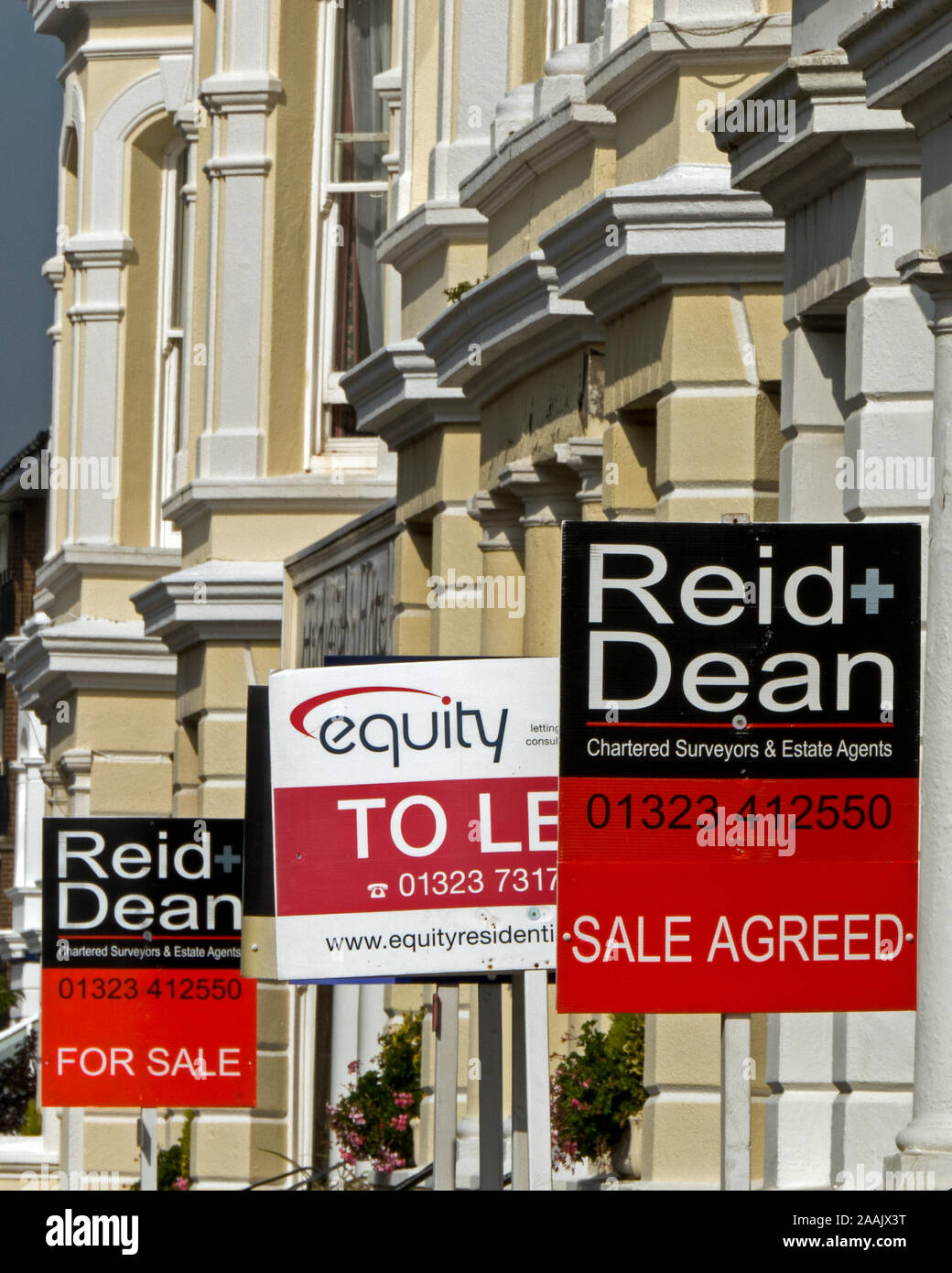 Street of Building with Estate Agents Signs: For sale, To Let, and Sale Agreed, Eastbourne, East Sussex, England, UK Stock Photo