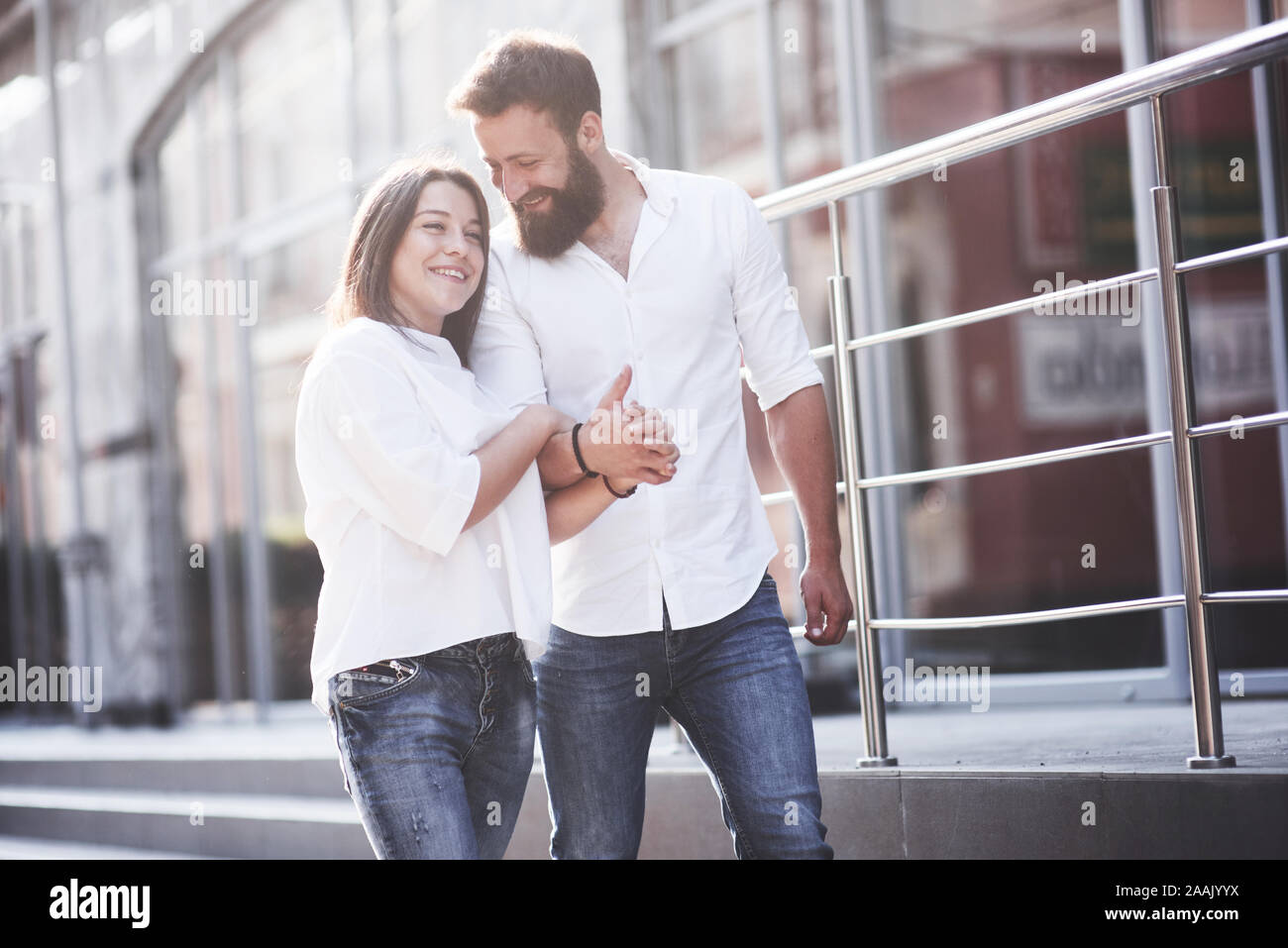 Beautiful happy couple hugging on the city street.Lifestyle concept love and romance Stock Photo