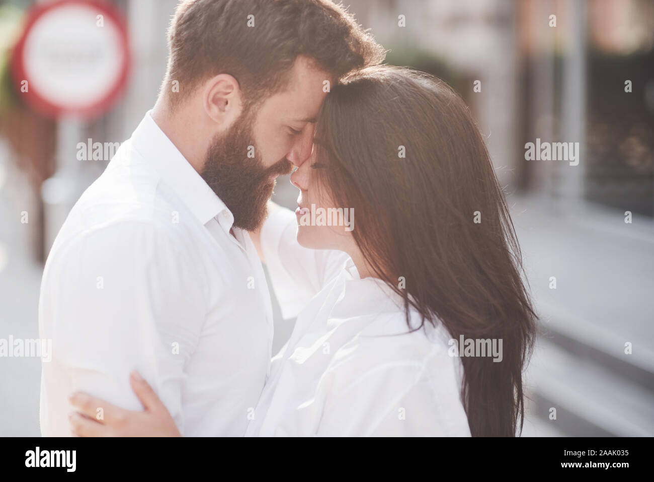 Beautiful happy couple hugging on the city street.Lifestyle concept love and romance Stock Photo