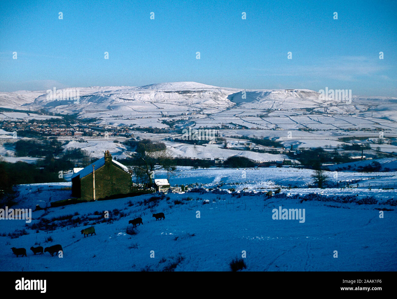 The snow covered Rossendale valley in the winter of 1980 looking towards the central Lancashire village of Helmshore and the hills of Scout Moor Stock Photo