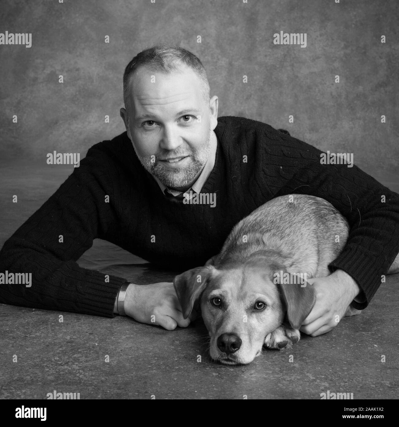 Portrait of man with dog Stock Photo