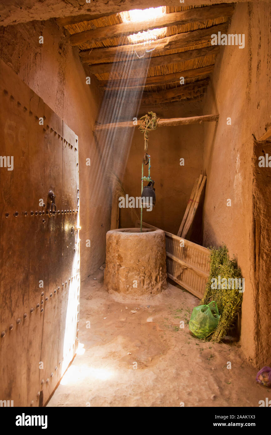 Water well. Interior of the Underground Kasbah of Tamegroute, Zagora region. Morocco Stock Photo
